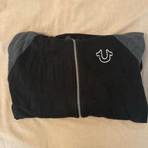 True religion zip up sweat shirt. Black with dark gray sleeves.